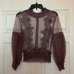 Lavender sheer blouse. With tank top that’s worn under. Bought in Japan. Small